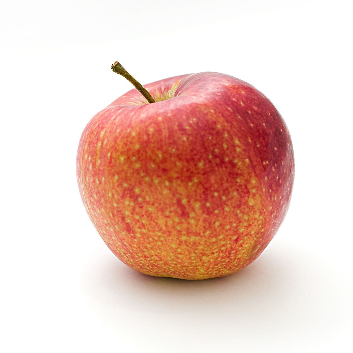 Fresh red apple with water droplets
